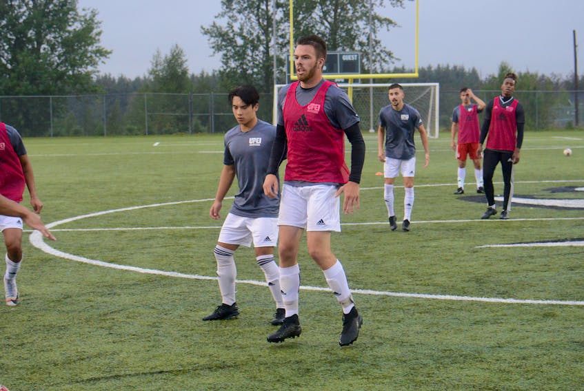 Lucas Ross, centre, is a fifth-year player for the UPEI Panthers’ men’s soccer team.