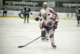 Morell's Stephen Anderson takes a shot during warm-up before his UNB Varsity Reds play the UPEI Panthers at MacLauchlan Arena during the 2018-19 Atlantic University Sport regular season.