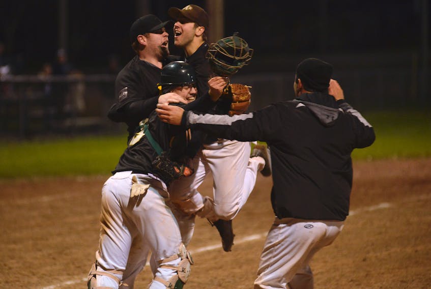 Members of The Alley Stratford Athletics celebrate their Kings County Baseball League title after winning an 11-marathon in Game 6 Sunday in Morell with the Chevies.