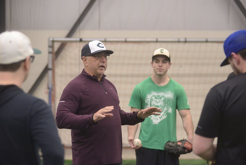 Doug Hines holds court with his Charlottetown Gaudet’s Auto Body Islanders before Thursday’s practice at the Norton Diamond Soccer Complex in Stratford. The team has been practising indoors for two months as it waits for the local fields to dry up.