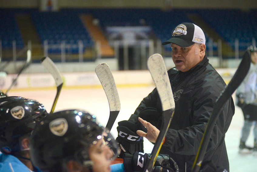 Associate coach Guy Girouard speaks to his Charlottetown Islanders players during a recent practice at the Eastlink Centre.