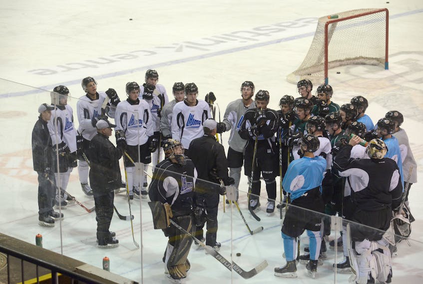 Head coach Jim Hulton speaks to his Charlottetown Islanders at the end of Wednesday’s practice.