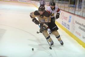 Charlottetown Islanders defenceman Lukas Cormier takes the puck to the net during the second period of Friday's Quebec Major Junior Hockey League game with the Halifax Mooseheads.