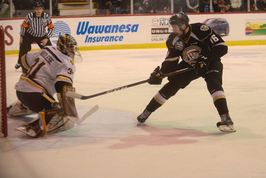 Charlottetown Islanders forward Jordan Maher is stopped by Cape Breton Screaming Eagles forward Kevin Mandolese Saturday at the Eastlink Centre.