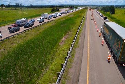 Traffic was backed up for kilometers at the main border crossing between Nova Scotia and New Brunswick on Friday. (AARON BESWICK PHOTO)