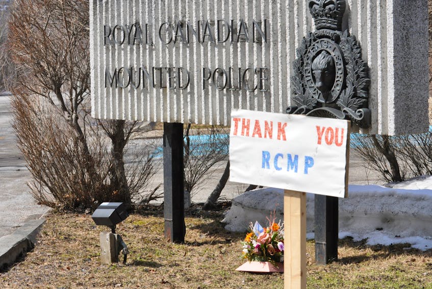 The tragedy of the last weekend’s mass shooting is being felt all over the country. This simple sign of thanks and a bouquet of flowers with flags from Nova Scotia and Newfoundland and Labrador were placed outside the Royal Canadian Mounted Police detachment in Corner Brook. RCMP Const. Heidi Stevenson is among the victims of the shooting. - Diane Crocker