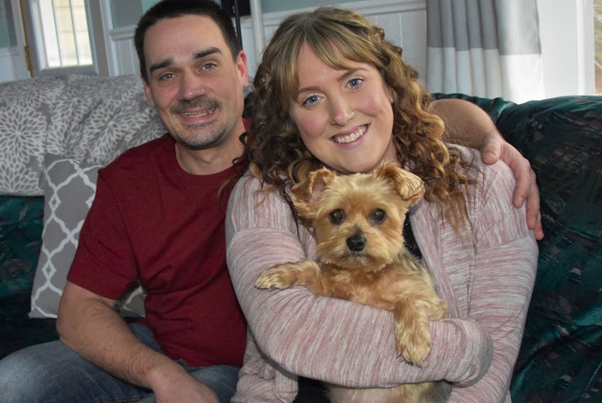 Yarmouth County couple Shane and Felicia Scott with their dog Bella. They’ve love to see their family grow with a child but infertility has brought them heartache instead.
TINA COMEAU PHOTO