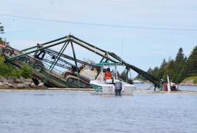 The bridge linking Durells Island to Canso collapsed Tuesday under the weight of a transport truck hauling a crane intended to help in the construction of its' replacement. (AARON BESWICK PHOTO)
