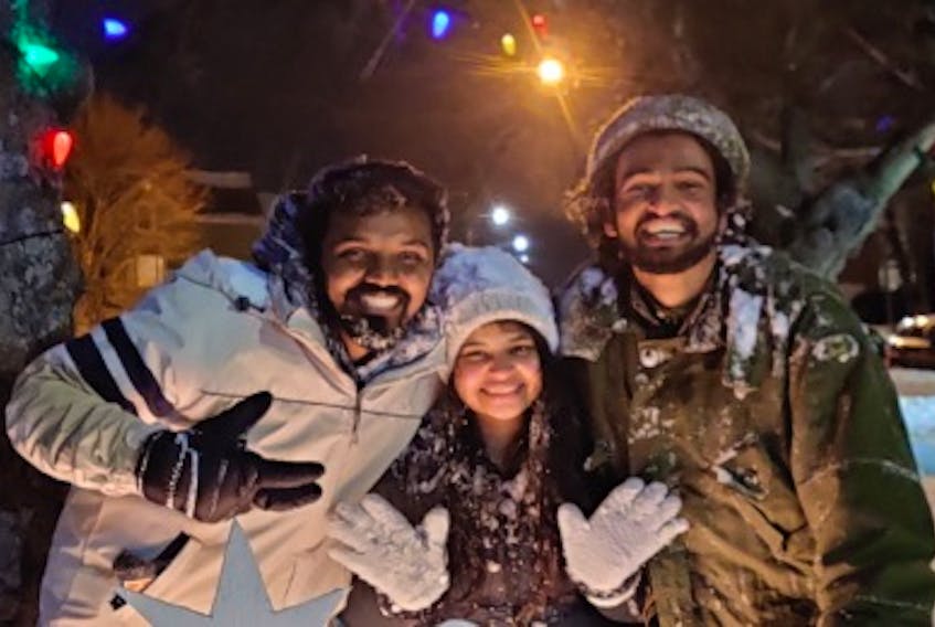 Winter adventures. From left, Abey Abraham, Ridhi Taneja and Prakyath Salian. CONTRIBUTED