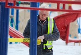 Colin MacLean/Journal Pioneer
City of Summerside employee David MacDonald spent part of his morning Tuesday cordoning off playground equipment around the community. The cities of Summerside and Charlottetown and the Public Schools Branch have all closed their playgrounds to combat the spread of the coronavirus (COVID-19) pandemic. Public parks with no play structures remain open. 