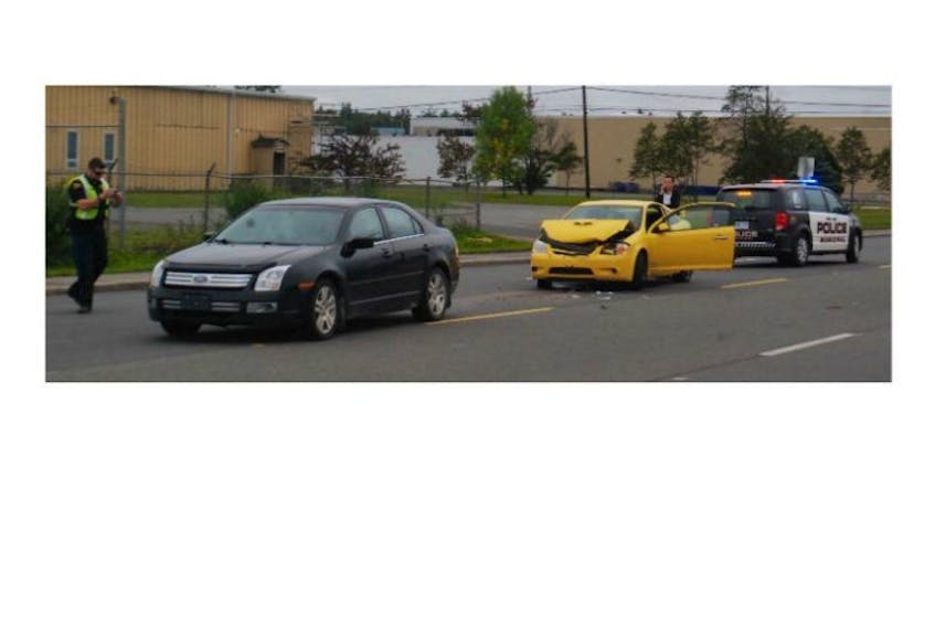 <p>Grand Falls-Windsor Municipal Police responded to a two-vehicle collision on Hardy Ave. near the intersection at Harris Ave. early Tuesday afternoon. The driver a 2006 Chevy Cobalt (pictured on telephone) reportedly rear-ended a 2009 Ford Focus.</p>
<p>&nbsp;</p>