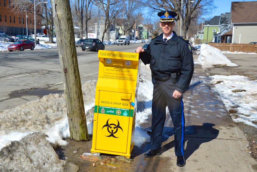 Robert Walsh, acting police chief of the Cape Breton Regional Police force, stands near a used needle drop-off kiosk on George Street in Sydney on Monday, one of the harm reduction strategies in place in the CBRM. NICOLE SULLIVAN/CAPE BRETON POST 