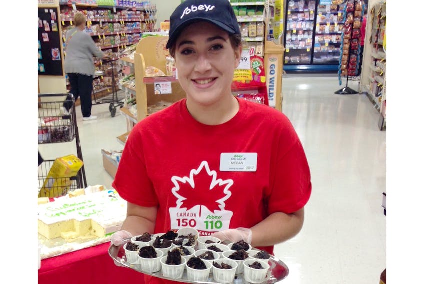 On Saturday, June 9, Sobeys in Liverpool will be hosting a food fair from 11 a.m. to 4 p.m. to celebrate everything local. Customers will have the chance to meet vendors and learn about local products. Pictured is Megan Dauphinee with tasty samples from last summer.