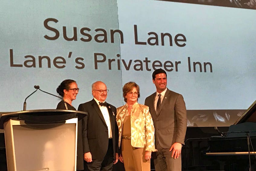 Two Queens County businesses recently won awards at the Tourism Industry Association of Nova Scotia (TIANS) 40th annual tourism summit in Halifax. The Quarterdeck won the Tourism Business of the Year Award and Lane’s Privateer Inn won the Pineapple Award. Here, Susan Lane receives her award.