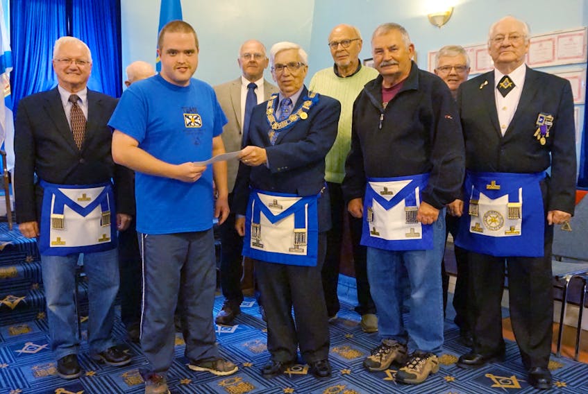 Cheque presentation Masons from Zetland Lodge #9.