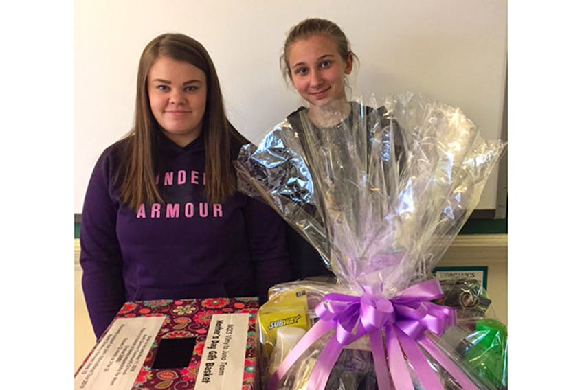 Students Abby Freeman and Justine Rogers are pictured with the Mother’s Day Basket.  The winner of this raffle will receive an overnight stay at Digby Pines Resort, green fees for two, an ultimate wine tour at Petite Riviere Vineyards, a grab bag of gift cards and a variety of items just for mom.
