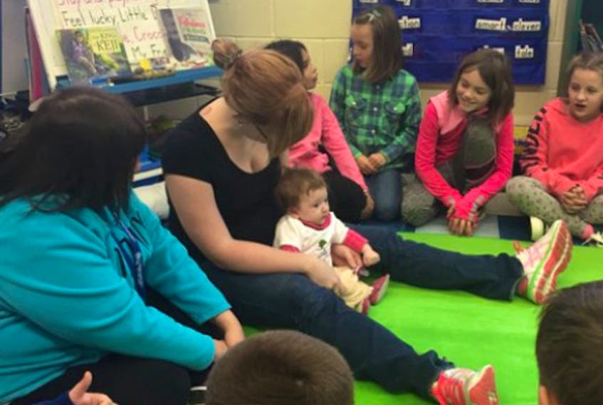 Kayleigh Roy and baby Summer Wolfe will visit a class of Grade 2/3 students at Dr. John C. Wickwire Academy in Liverpool several times over the course of the year as part of a Roots of Empathy program, helping students to learn many social skills, including empathy.