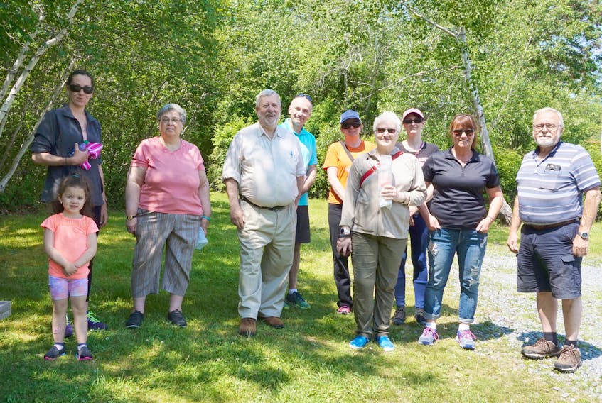 About half a dozen people came out for a stroll on the Meadow Pond Brook walking trail June 21. David Dagley, mayor of the Region of Queens Municipality, led the first walk for a new summer program called Queens Walks.