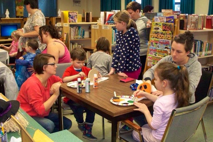 The Buchans Public Library was a hive of activity as children and their parents attended a Halloween craft session Oct. 24. Twenty-one participants took part in the event.