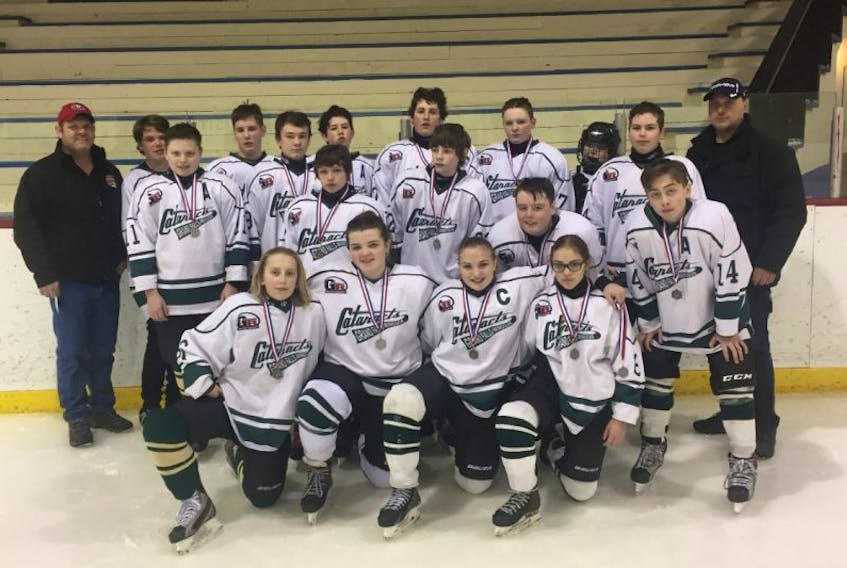 The silver medal winning Grand Falls-Windsor Bantam B Cataracts include, front, left to right, Ian MacDonald, Shannon Ivey, Savannah Rice and Mackenzie Andrews. Middle, Eric Hewitt, Raymond Healey, Riley Hynes, Aidan Pelley and Nick Winsor. Back, Coach Jeff Rice, Gavin Blanchard, Spencer King, Jaden Nash, Terrence Hancock, Eddie Lyver, Micheal Wight, Nathan Hewitt, Alexander Hewitt and Coach Todd Andrews. Missing from photo, Lexi Small, Coach Rod Winsor, and Trainer Andrew Pelley.