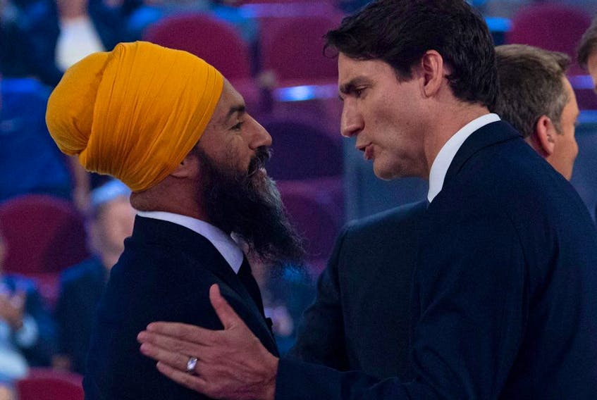 Liberal Leader Justin Trudeau (right), and to some extent NDP leader Jagmeet Singh, hammered Conservative party Leader Andrew Scheer and even Green party Leader Elizabeth May, over two wedge issues with ties to religion.