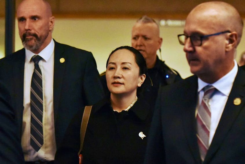  Huawei chief financial officer Meng Wanzhou is pictured in this Jan. 23, 2020 file photo in Vancouver, B.C. leaving B.C. Supreme Court.