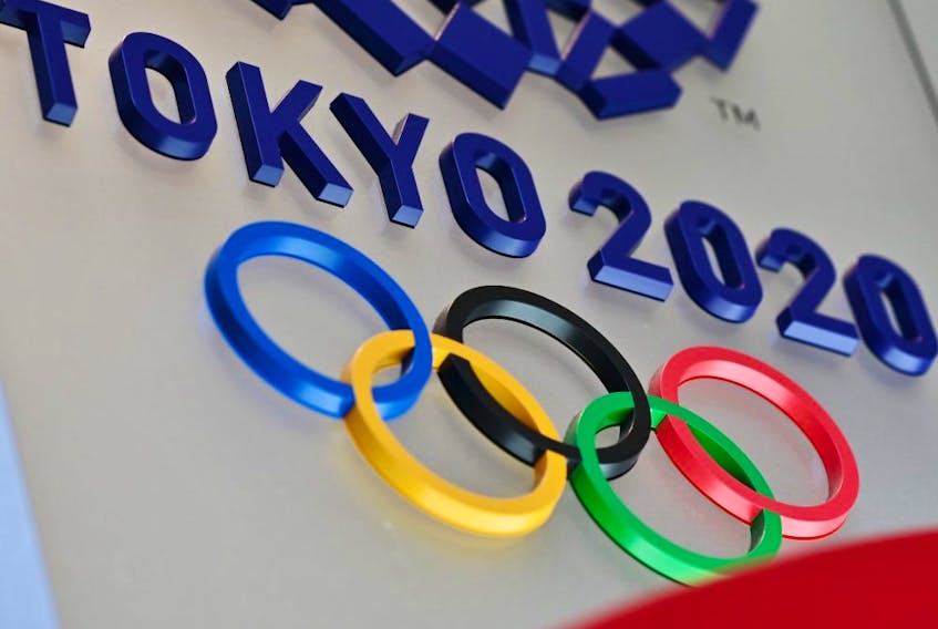 The logo for the Tokyo 2020 Olympic Games is seen in Tokyo. Senior International Olympic Committee (IOC) official Dick Pound said March 23, 2020 a postponement of this year's Tokyo Olympics is now inevitable as the world reels from the coronavirus pandemic. 