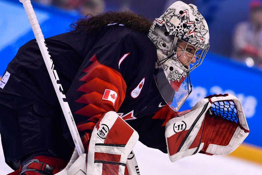 Canada's Shannon Szabados defends her goal during the preliminary round match between Canada and Finland in the Pyeongchang 2018 Winter Olympic Games at the Kwandong Hockey Centre in Gangneung, South Korea, on Feb. 13, 2018.