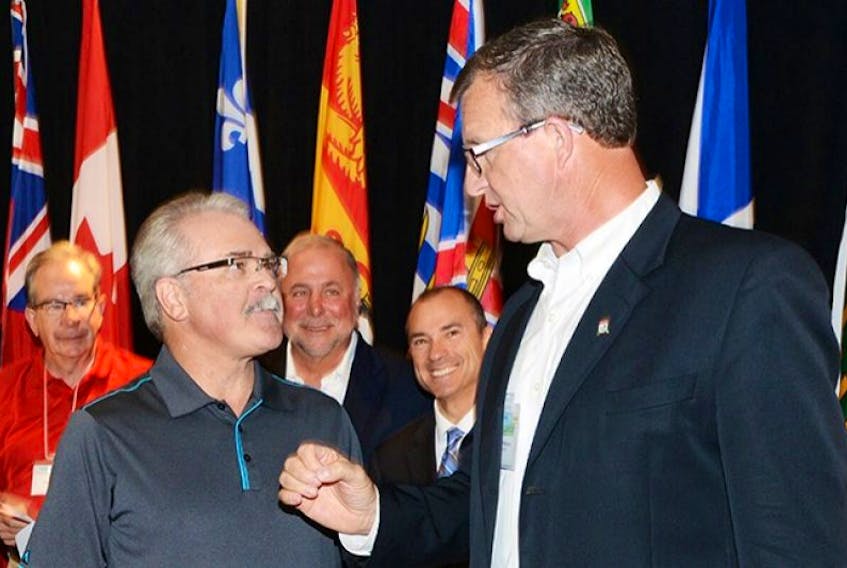 <span class="BodyText">Federal Agriculture Minister Gerry Ritz, left, and Prince Edward Island Minister of Agriculture and Fisheries Alan McIsaac chat after a press conference held at the Delta Hotel Friday. Federal, provincial and territorial agriculture ministers held their annual meeting in Charlottetown.</span>