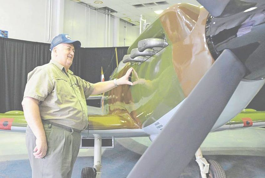 <p>Retired RCAF airman Stan Surette was on hand Wednesday for the announcement that the Atlantic Canada International Airshow will be returning to Summerside. While there, he got to take a look at a slightly scaled down model of a spitfire fighter plane.&nbsp;</p>
