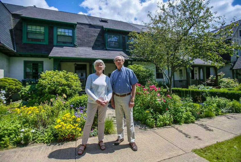Mary Reardon and Bill Stewart are seen in front of their Hydrostone home in Halifax in July. They represent a group that calls for regulations on short-term rentals.