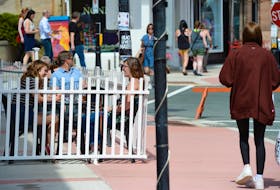 Water Street in St. John’s appeared a little busier Thursday after the province went to alert level 2. Diners and pedestrians took advantage of the sun and warm weather to stroll the downtown and eat at some of the restaurants, including ones with outdoor patios. 
