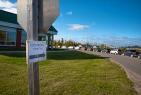 Happy Valley-Goose Bay saw a long lineup of cars at the COVID-19 testing centre Thursday after a warning was issued by public health of possible exposure in two local stores. (Photo by Shawn Rivoire/Special to The Telegram)