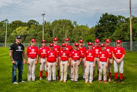 Annapolis Valley native Mark Long, left, creator of the Cracked Armour clothing line, recently donated jerseys and hats to the Peewee AAA Kentville Wildcats baseball team. The young players have been wearing the gear proudly. CONTRIBUTED