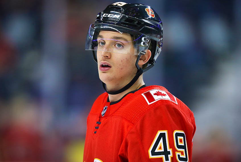 Calgary Flames Jakob Pelletier during warm-up before facing the Vancouver Canucks during pre-season NHL hockey in Calgary on Monday September 16, 2019. Al Charest / Postmedia