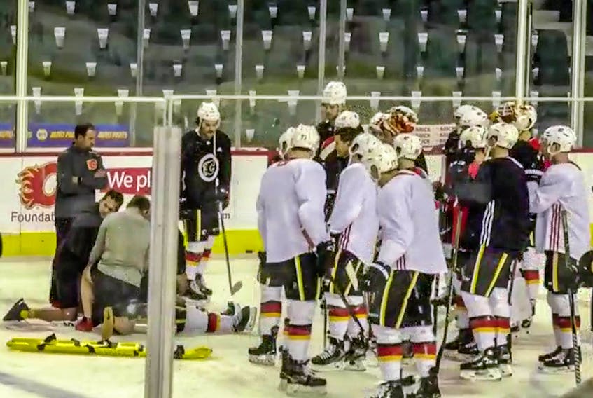 CTV Calgary video frame grab of Calgary Flames defenceman TJ Brodie, who collapsed during practice Thursday afternoon at Scotiabank Saddledome. 