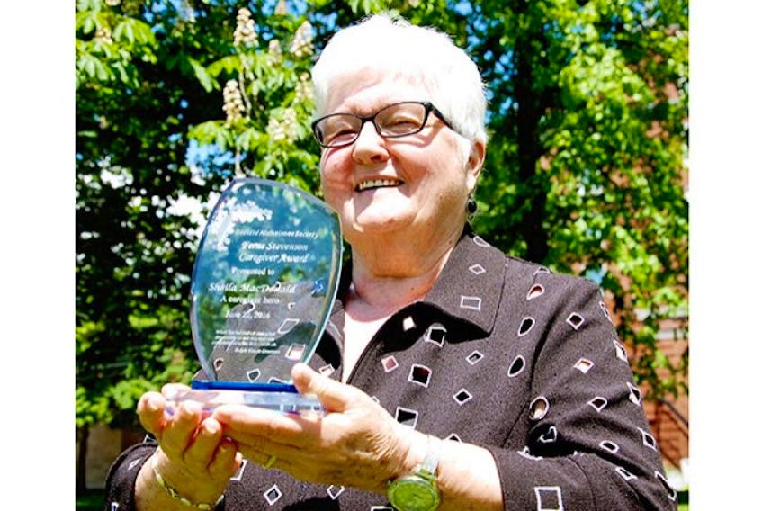<p>Sheila MacDonald says she is “really shocked...humbled and honoured” to receive the Ferne Stevenson Caregiver Award from the Alzheimer Society of P.E.I. The award recognizes a caregiver who exemplifies compassion in person-centred care while promoting programs and services for those affected by Alzheimer's disease and related dementias.</p>