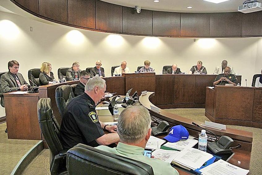 Amherst brought down its 2017-18 budget on Monday that holds the residential tax rate at last year's level and reduces the commercial rate by two cents per $100 assessment.