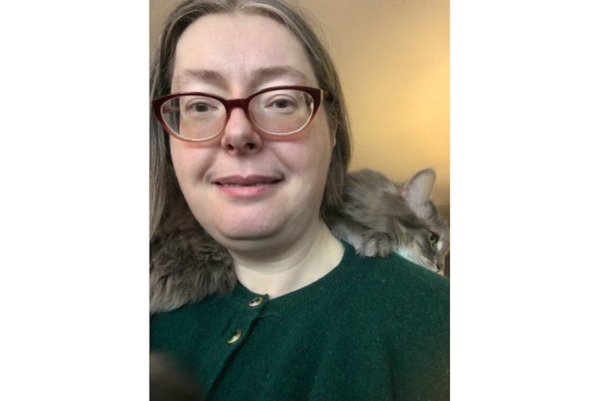 Imber the cat finds a resting place on autism advocate Trudy Goold's shoulder. The St. John's, NL woman was diagnosed with Asperger’s, which is on the autism spectrum disorder, as an adult.