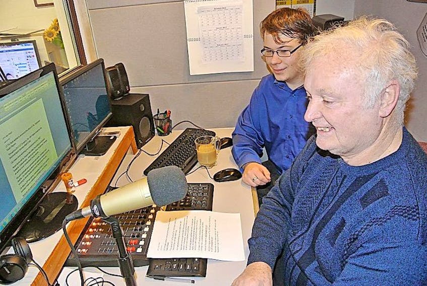 James Hand of CFTA and Dale Fawthrop of the Tantramar Radio Players look over a script for the 1867 News that will air on the community radio station throughout 2017 to help celebrate Canada’s 150th birthday. 