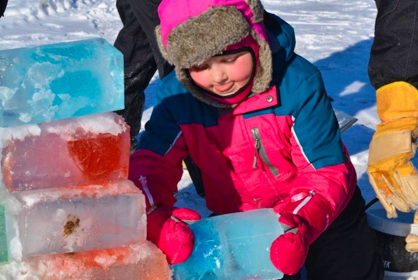 The Amherst Winter Carnival is always a great chance for families to get out and have fun. Last year, Four-year-old Kaelyn Gray helped build an ice fort.