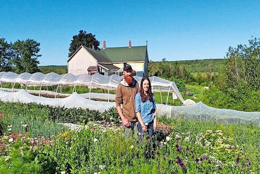 Bryan Dyck (left) and Shannon Jones are farmers from Ontario who have established themselves well into the community with their organic farm in River Hebert.