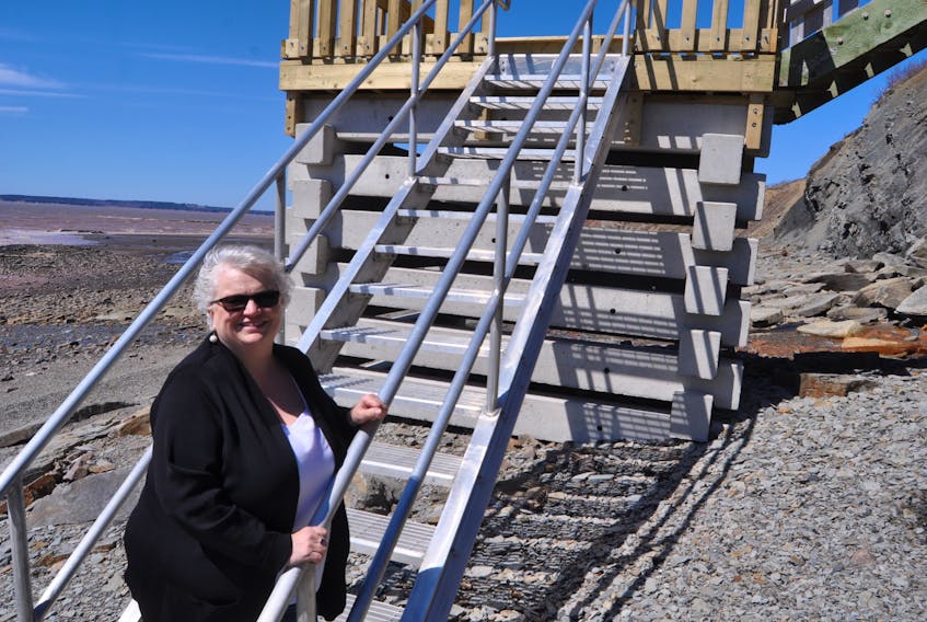 Laurie Glenn Norris, education and outreach manager at the Joggins Fossil Centre, is thrilled with the new steps installed to the beach. The bottom section of the steps often has to be replaced each year due to winter damage, but measures were taken this year to address the problem.