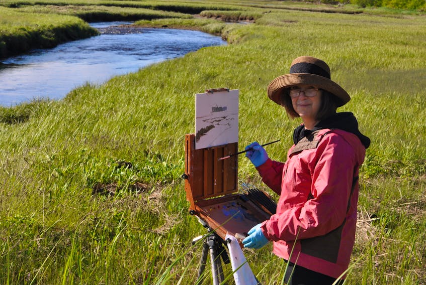 Susan Paterson of Dartmouth was one of 35 artists taking part in the second annual Parrsboro International Plein Air Festival on June 14-17. She was found painting this scene in Fox River on Friday morning.