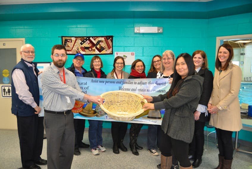 The Multicultural Association of Cumberland gathered with its partners recently to launch its new Building a Basket Initiative. On hand were (from left) James Austin, Brent Noiles, Bill Schurman, Sally Austin, Heather Gallant, Colleen Dowe, Trina Clarke, Lisa Emery, Hee Yeon Son, Connie Fisher and Sarah MacMaster.