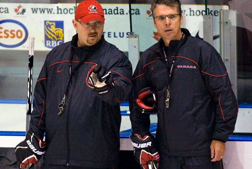 Then Team Canada assistant coach Andre Tourigny, left, follows the action during practice at the national junior hockey team development camp in St. John's, N.L. in 2010 with head coach Dave Cameron. Tourigny coached the Halifax Mooseheads in 2016-17.