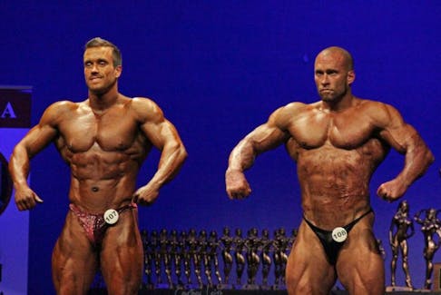 Brothers Andrew (left) and Adam Dove earned the Top 2 positions in the light heavyweight division at the Newfoundland and Labrador Amateur BodyBuilding Association championships last week. Adam survived a near-fatal accident that burned 60 percent of his body in 2011 and overcame all odds to compete and place at the event.