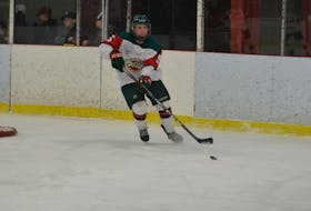 Kensington Wild rookie defenceman Crosby Andrews makes a pass during a New Brunswick/Prince Edward Island Major Midget Hockey League game earlier this season. The Wild hosts the first-place Moncton Flyers at Credit Union Centre on Saturday at 7:30 p.m.