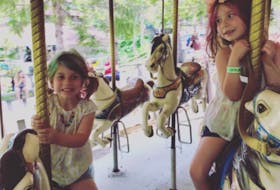 Harper and Finleigh MacNeil of Nictaux were lucky enough to enjoy one more ride on the carousel at Upper Clements the summer before the park’s closure was announced in the spring of 2020. 