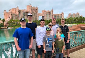 Mark Johnston, back, second from right, said having the Children’s Wish Foundation (which has since merged with and is now known as Make-A-Wish Canada) grant his son Ewan Johnston’s wish of a family vacation to Atlantis in the Bahamas made a big difference and a lasting impression. CONTRIBUTED